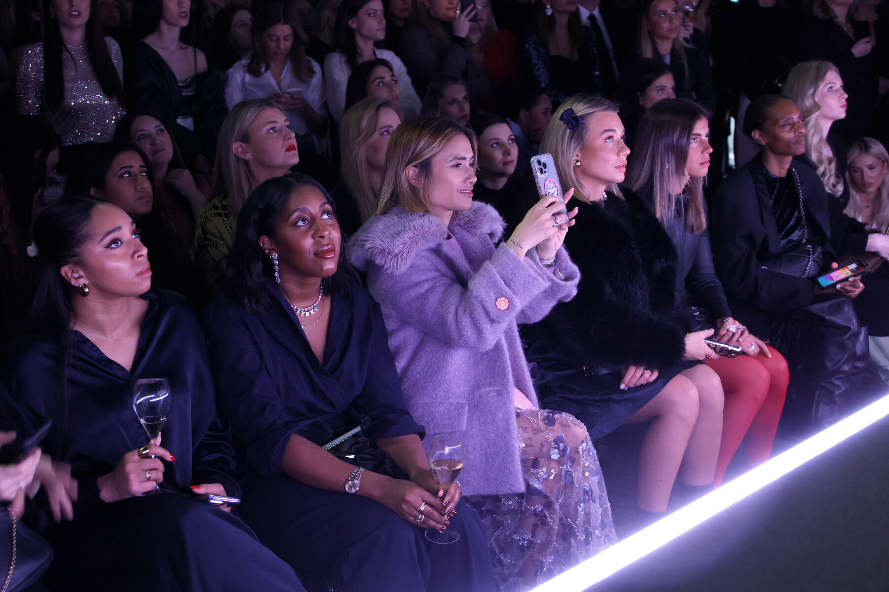 Front row guests watching the Airstrait presentation