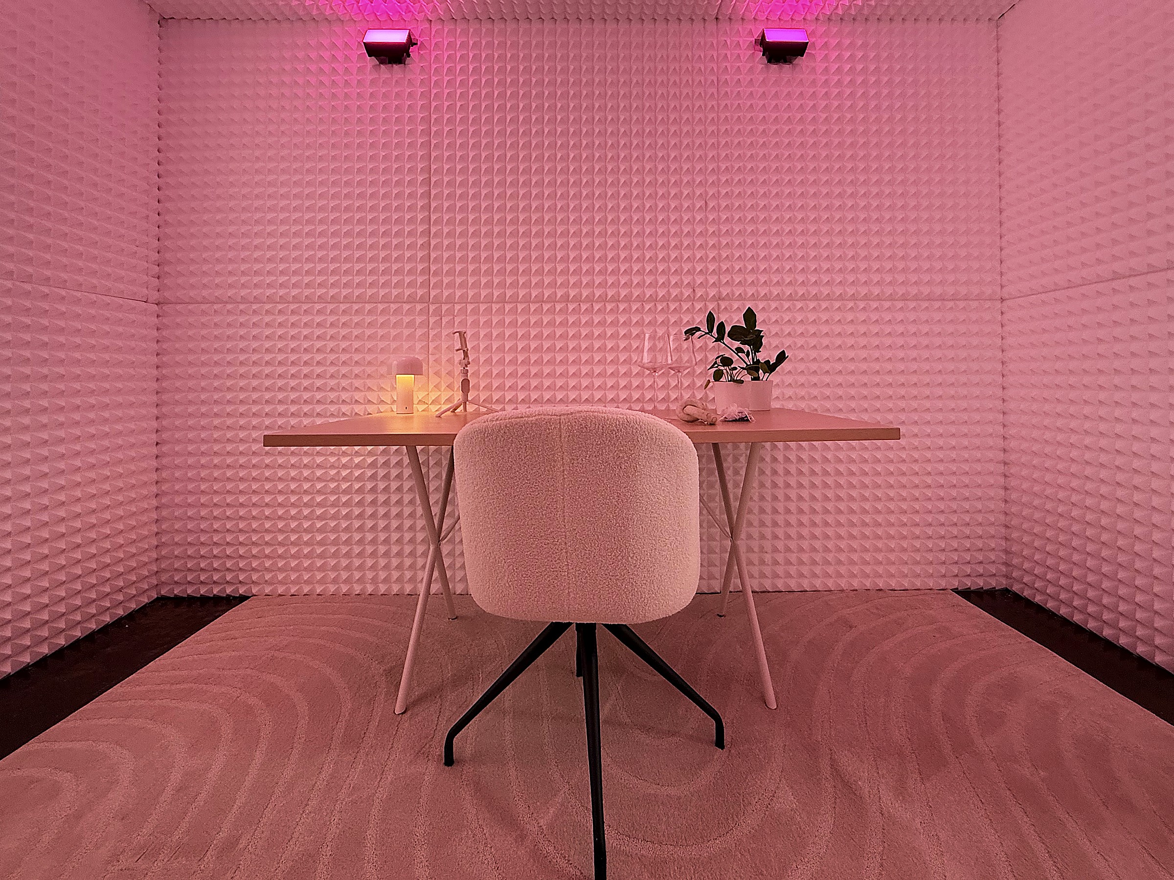Recording and edit space, acoustic-panelled and lit in pink