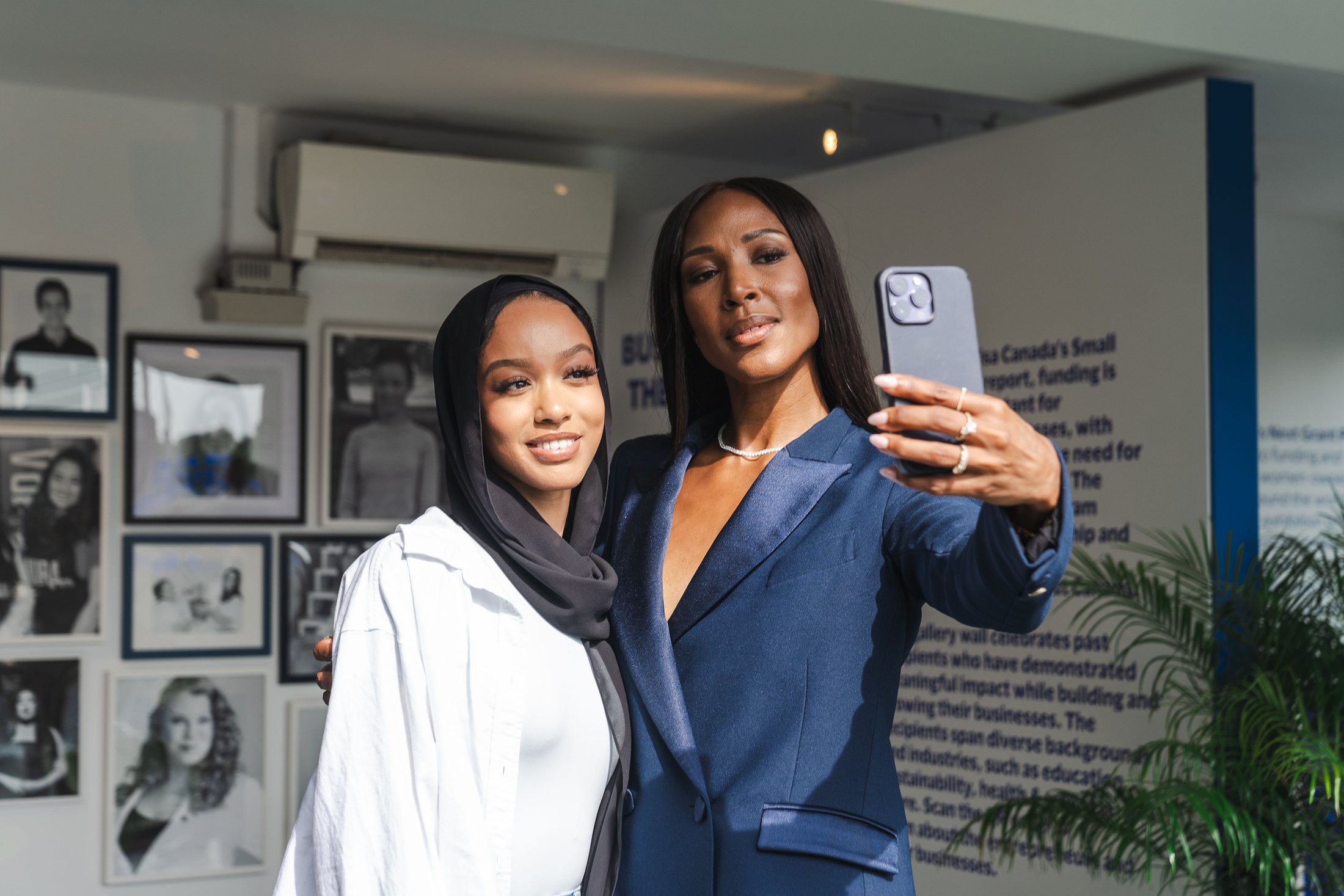 Visa She's Next guests capturing a portrait together